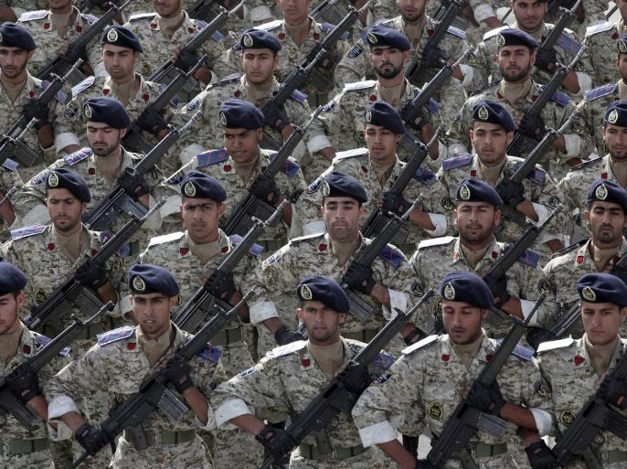 Iranian army troops march in a parade marking National Army Day, in front of the mausoleum of the late revolutionary founder Ayatollah Khomeini, just outside Tehran, Iran, Thursday, April 18, 2013. Ahead of the parade, Iran's President Mahmoud Ahmadinejad slammed "foreign presence" in the Persian Gulf, claiming it's the source of insecurity in the region.