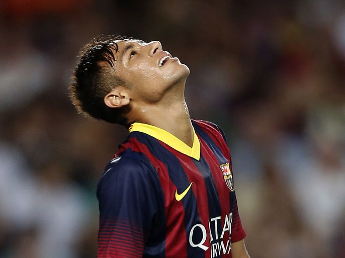 Barcelona's Brazilian forward Neymar da Silva Santos Junior reacts during the 48th Joan Gamper Trophy football match FC vs Santos at the Camp Nou stadium in Barcelona on August 2, 2013. AFP PHOTO/ JOSE JORDAN