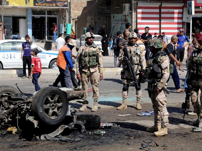 ‪عدة تفجيرات جرت في أوقات متزامنة بأحياء مختلفة من بغداد‬ (أسوشيتد برس)