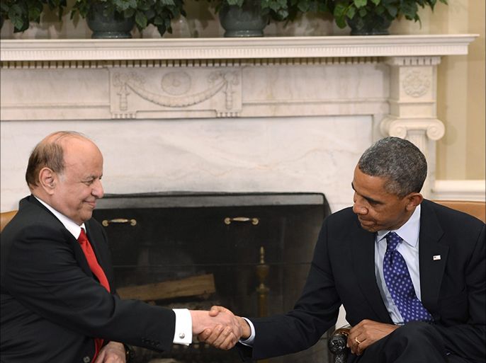 US President Barack Obama (R) shakes hands with Yemeni President Abdo Rabbu Mansour Hadi (L) after their meeting in the Oval Office of the White House in Washington, DC, USA, 01 August 2013.