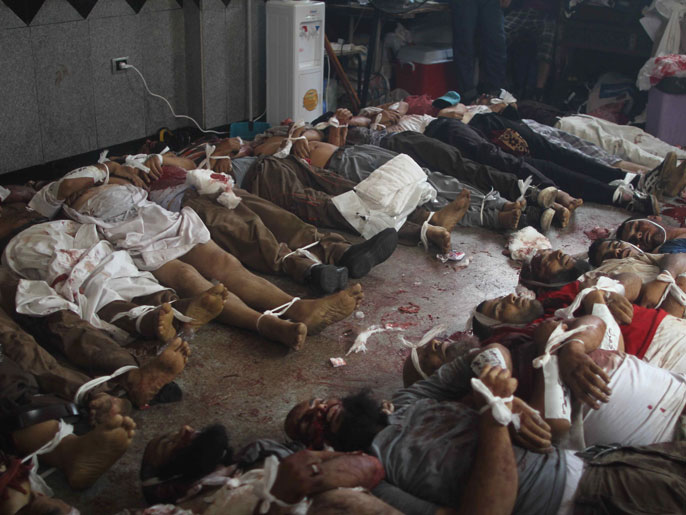 ‪(الفرنسية)‬ جثث لقتلى سقطوا برصاص قوات الأمن المصرية أثناء فض اعتصامي رابعة العدوية والنهضة 