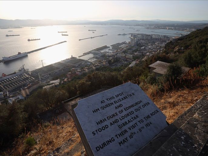 GIBRALTAR - AUGUST 06:  A plaque marks the spot where Queen Elizabeth II viewed the town of Gibraltar from the 'Upper Rock Nature Reserve' on the Rock of Gibraltar during her visit in 1954, on August 6, 2013 in Gibraltar. Tensions between the British and Spanish governments have been raised on issues surrounding the sovereignty of Gibraltar. An increase in Spanish border crossing checks between the Rock and mainland Spain, leading to lengthy queues, is widely considered to be a retaliatory move for the construction of an artificial reef in British waters, which it is claimed has had a negative impact on Spanish fishing vessels in the area.