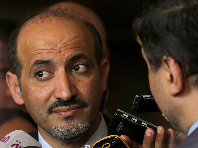 epa03796007 Head of the Syrian National Coalition, Ahmed al-Jarba, speaks to reporters following a meeting with Egyptian Foreign Minister Nabil Fahmy (not pictured) at the foreign ministry headquarters in Cairo, Egypt, 21 July 2013. Egypt said it would review relations with Syria, a month after the toppled president Mohamed Morsi severed them. Egypt had tightened entry regulations for Syrians, asking those willing to enter the county to obtain a visa and security approval. EPA/MOHAMMED SABER
