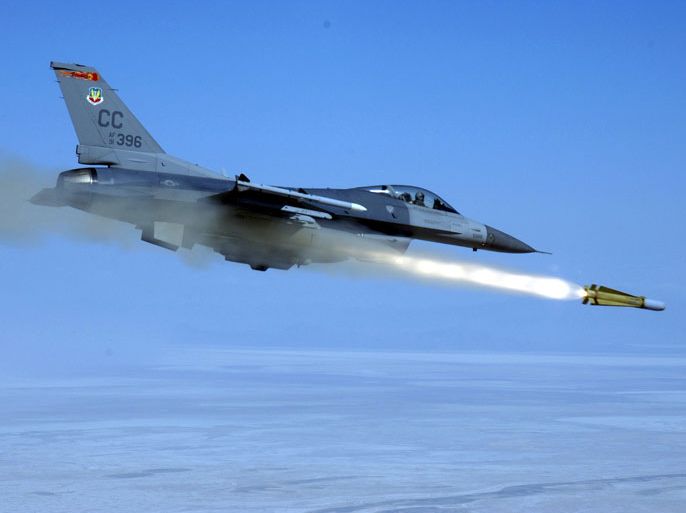 An F-16C Fighting Falcon from the 522nd Fighter Squadron, Cannon Air Force Base, N.M., fires an AGM-65H Maverick air-to-ground missile at a Utah Test and Training Range target near Hill Air Force Base, Utah, during a Combat Hammer mission, 25 May 2004. Combat Hammer is an Air-to-Ground Weapons System Evaluation Program hosted by the 86th Fighter Weapons Squadron from Eglin Air Force Base, Fla. EPA/DoD photo by Master Sgt. Michael Ammons