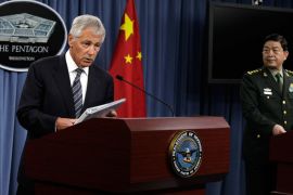 U.S. Defense Secretary Chuck Hagel (L) and China's Minister of National Defense General Chang Wanquan speak at a joint news conference following their meeting at the Pentagon in Washington August 19, 2013. REUTERS/Yuri Gripas (UNITED STATES - Tags: POLITICS MILITARY)