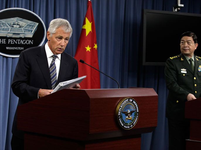 U.S. Defense Secretary Chuck Hagel (L) and China's Minister of National Defense General Chang Wanquan speak at a joint news conference following their meeting at the Pentagon in Washington August 19, 2013. REUTERS/Yuri Gripas (UNITED STATES - Tags: POLITICS MILITARY)