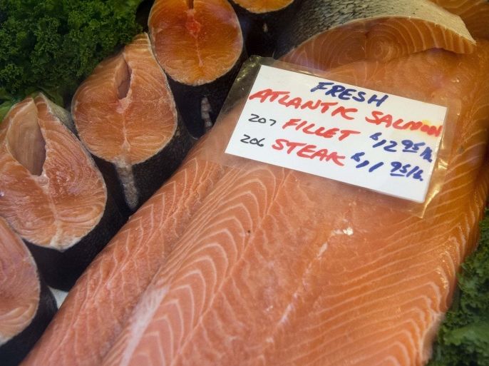Fresh Atlantic salmon steaks and fillets are displayed for sale at Eastern Market in Washington, DC, August 6, 2013. The market, located on Capitol Hill, is Washington's oldest continually operated fresh food public market and offers local, farm fresh produce including fruits and vegetables, as well as meats, cheeses and fish.