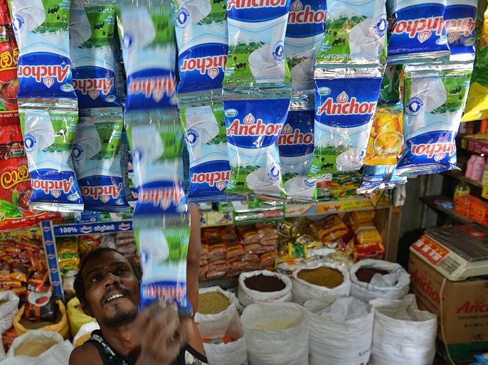 A Sri Lankan vendor sells New Zealand-made milk products in Colombo on August 6, 2013 even as the government ordered a recall following the global alert for botulism in some dairy products manufactured by dairy giant Fonterra. Sri Lanka was following many other nations in ordering the recall after Fonterra said some exported whey products, including infant formula, may contain bacteria that could lead to the potentially fatal illness.