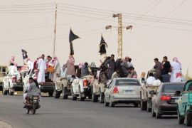 A funeral convoy carrying the bodies of four Egyptian militants, drives through the small Sinai village of Sheikh Zuweid and several border towns in the north of the Sinai peninsula on August 10, 2013. The Egyptian militant group, Ansar Beit al-Maqdis, said four of its members belonging to Sinai tribes had been killed by Israeli drones on August 9.