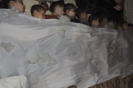 A view shows bodies of children covered with ice whom activists say were killed by gas attack in al-Ghouta area, in the eastern suburbs of Damascus, August 21, 2013. Syria's opposition accused President Bashar al-Assad's forces of gassing many hundreds of people - by one report as many as 1,300 - on Wednesday in what would, if confirmed, be the world's worst chemical weapons attack in decades.