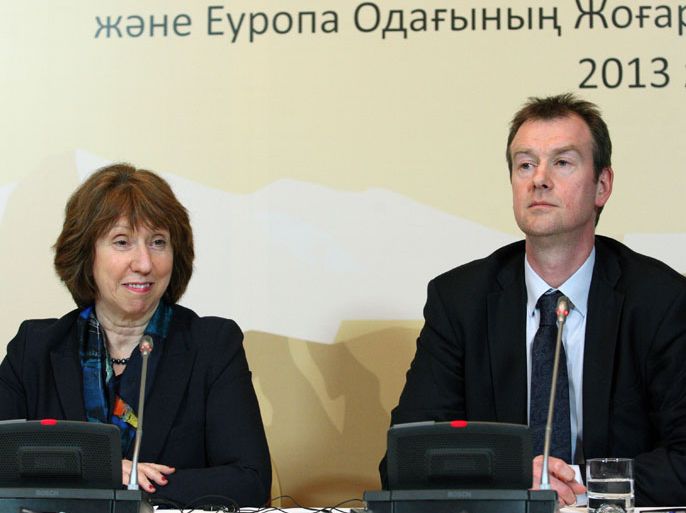 epa03651787 High Representative of the Union for Foreign Affairs Catherine Ashton (L) and her Chief Spokesman Michael Mann (R) are seen at a press conference during talks on Iran's nuclear programme in the Kazakh city of Almaty, 06 April 2013. Wide differences separate the international community and Iran after a new round of talks on Iran's nuclear programme, EU foreign policy chief Catherine Ashton said. EPA/IGOR KOVALENKO