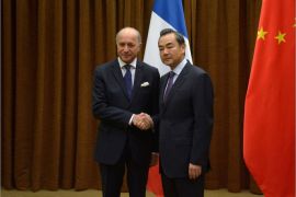 epa03868199 French Foreign Minister Laurent Fabius (L) shakes hands with Chinese Foreign Minister Wang Yi (R) before their meeting at the Chinese Foreign Ministry in Beijing, China, 15 September 2013. French Foreign Minister Laurent Fabius visits Beijing to discuss Syria. EPA/WANG ZHAO / POOL