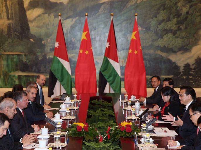 BEJ055 - Beijing, -, CHINA : Jordan's King Abdullah II (3rd L) meets with Chinese Premier Li Keqiang (3rd R) at the Great Hall of People in Beijing on September 18, 2013. King Abdullah II was to visit China from September 15 to 18, following an invitation from China's President Xi Jinping. AFP PHOTO / POOL / FENG LI