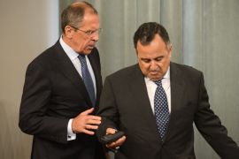 Russian Foreign Minister Sergei Lavrov (L) speaks with his Egyptian counterpart Nabily Fahmy during their joint press conference in Moscow, on September 16, 2013. Lavrov met today Egypt's Foreign Minister to discuss bilateral relations and the situation in the Middle East. AFP PHOTO / VASILY MAXIMOV