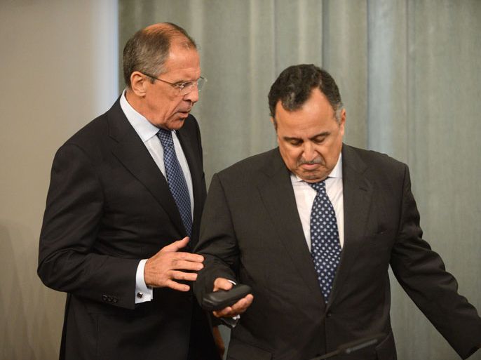 Russian Foreign Minister Sergei Lavrov (L) speaks with his Egyptian counterpart Nabily Fahmy during their joint press conference in Moscow, on September 16, 2013. Lavrov met today Egypt's Foreign Minister to discuss bilateral relations and the situation in the Middle East. AFP PHOTO / VASILY MAXIMOV