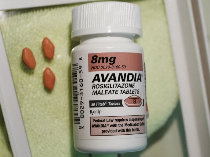 FILE - In this June 30, 2010 file photo, three Avandia pills are displayed near the bottle in Palo Alto, Calif. The Food and Drug Administration is reviewing a new interpretation of Avandia's heart attack risk, which suggests that the drug is as safe as older diabetes drugs.
