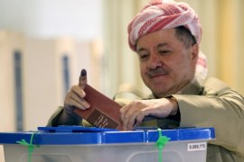 Kurdish regional president Massud Barzani casts his ballot during the Kurdistan's legislative election at a polling station on September 21, 2013 in the northern Kurdish city of Arbil. Iraq's Kurds vote for their parliament as the autonomous region grapples with disputes with the federal government while fellow Kurds fight bloody battles across the border in Syria.