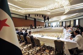 Members of Syrian National coalition (SNC) attend a meeting of the National Coalition of Syrian Revolution and Opposition forces on September 13, 2013, in Istanbul.