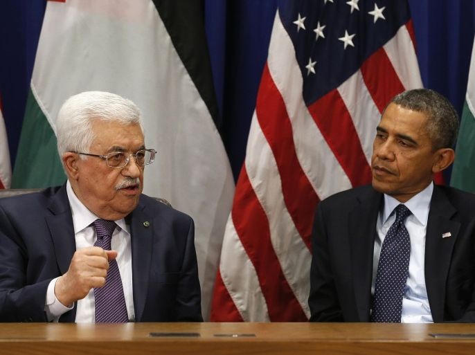 U.S. President Barack Obama (R) meets with Palestinian President Mahmoud Abbas during the United Nations General Assembly in New York September 24, 2013.