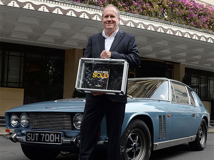 Caption:epa03882989 British novelist and screenwriter William Boyd holds his new James Bond novel 'Solo' following the book's launch at the Dorchester Hotel in London, Britain, 25 September 2013. Boyd signed seven copies of the new Bond chapter before they were handed to British Airways flight attendants and later dispatched to seven cities around the world - Amsterdam, Edinburgh, Zurich, Los Angeles, Delhi, Cape Town, and Sydney. EPA/ANDY RAIN