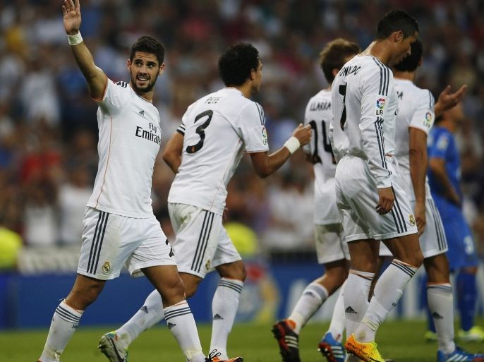 Real Madrid's Isco celebrates his goal during their Spanish first division soccer match against Gefafe at Santiago Bernabeu stadium in Madrid September 22, 2013.