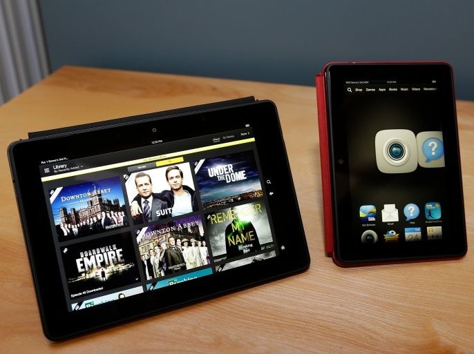 The 8.9-inch Amazon Kindle HDX tablet computer is shown at left next to the 7-inch Amazon Kindle HDX, right, Tuesday, Sept. 24, 2013, in Seattle. Amazon has refreshed its line-up of tablets with the new devices, which are significantly faster and lighter than the previous generation.