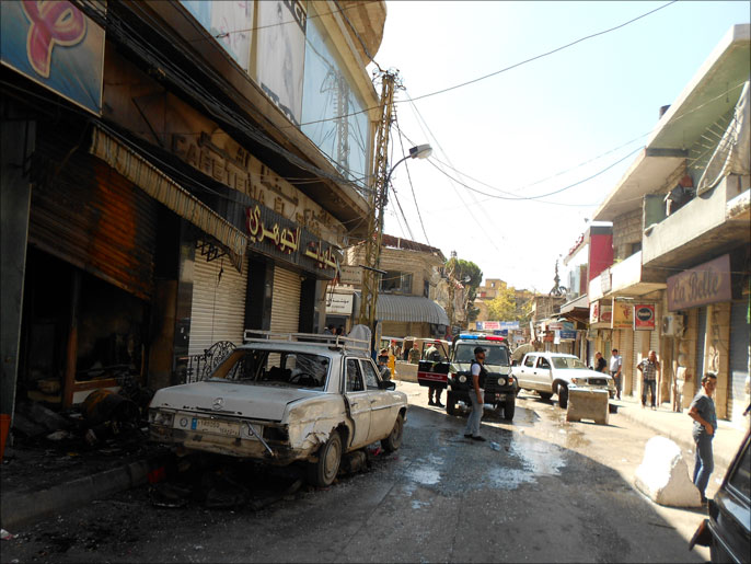 ‪مدينة بعلبك شرق لبنان بعد يوم من الاشتباك بين عناصر حزب الله وإحدى الأسر‬ (الجزيرة)