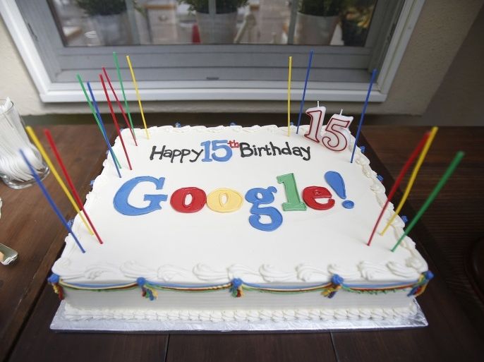 A Google-themed birthday cake is seen at the house where Google was founded on the company's 15th anniversary in Menlo Park, California September 26, 2013.