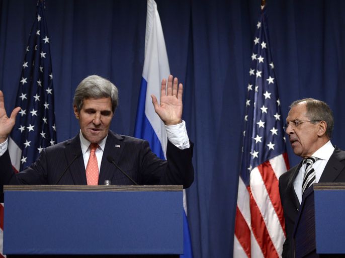 US Secretary of State John Kerry (L) gestures next to Russian Foreign Minister Sergey Lavrov during a press conference in Geneva on September 14, 2013 after they meet for talks on Syria's chemical weapons. Washington and Moscow have agreed a deal to eliminate Syria's chemical weapons, Kerry said after talks with Lavrov