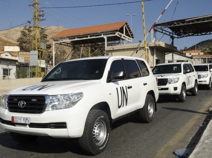 A convoy of vehicles carrying United Nations inspectors leaves the Masna'a border crossing between Lebanon and Syria in eastern Bekaa region of Lebanon September 30, 2013. U.N. chemical weapons inspectors investigating allegations of chemical and biological weapons use during Syria's civil war left Damascus on Monday after their second mission in two months, witnesses said.