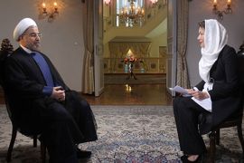 Iranian President Hassan Rouhani speaks during an interview with Ann Curry (R) from the U.S. television network NBC in Tehran, in this picture taken September 18, 2013, and provided by the Iranian Presidency. Rouhani said in the television interview with NBC News on Wednesday that his government would never develop nuclear weapons and that he had "complete authority" to negotiate a nuclear deal with the West.