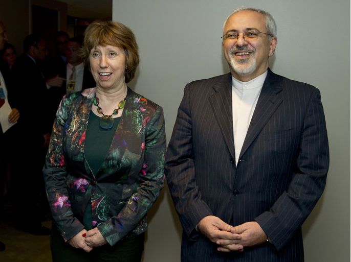 EU High Representative for Foreign Affairs and Security Policy Catherine Ashton (L) greets Iran's Foreign Minister Mohammad-Javad Zarif (R) before the five permanent members of the United Nations Security Council plus Germany meet with Iran over their nuclear program September 26, 2013 on the sidelines of the General Assembly at UN headquarters in New York. AFP PHOTO/Stan HONDA