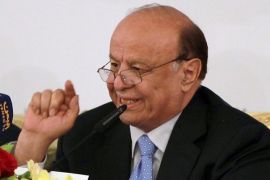 Yemen's President Yemeni President Abdrabuh Mansur Hadi speaks during the closing session of a conference on national dialogue in the Yemeni capital Sanaa, on October 8, 2013. Hadi said that the issue of the South would be resolved 'in a few days.'
