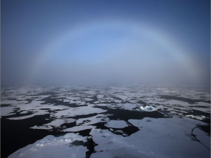 epa03839838 A photo made available 28 August 2013 shows a rainbow appearing over the horizon in the Arctic on Aug. 27, 2013. This photo was taken aboard South Korean icebreaker Araon, which was sailing through the Chukchi Sea in the polar region. The 7,487-ton ship is conducting environmental studies in the region EPA/YNA SOUTH KOREA OUT