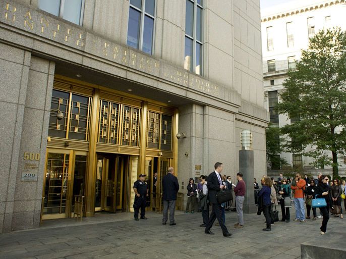 A line of people wait for a security check to enter the Federal Courthouse October 15, 2013 in New York. A Libyan Al-Qaeda suspect is to be arraigned in New York on Tuesday in connection with the 1998 bombings of two US embassies in East Africa that killed 224 people. Anas al-Libi was snatched from the streets of the Libyan capital Tripoli by US commandoes on October 5 and brought to New York at the weekend for trial.