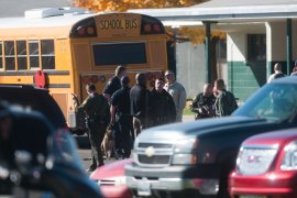 SPARKS, NV - OCTOBER 21: Law enforcement gather in the parking lot after a shooting at Sparks Middle School October 21, 2013 in Sparks, Nevada. A staff member was killed and two students were injured after a student opened fire at the Nevada middle school. The suspected gunman was also killed. David Calvert/Getty Images/AFP== FOR NEWSPAPERS, INTERNET, TELCOS & TELEVISION USE