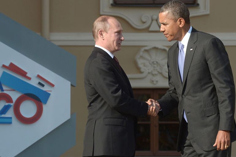 epa03863811 (FILE) A file photograph dated 05 September 2013 shows Russian President Vladimir Putin (L) shaking hands with US President Barack Obama (R) during a welcome ceremony for participants arriving for the first working session of G20 summit in St. Petersburg, Russia