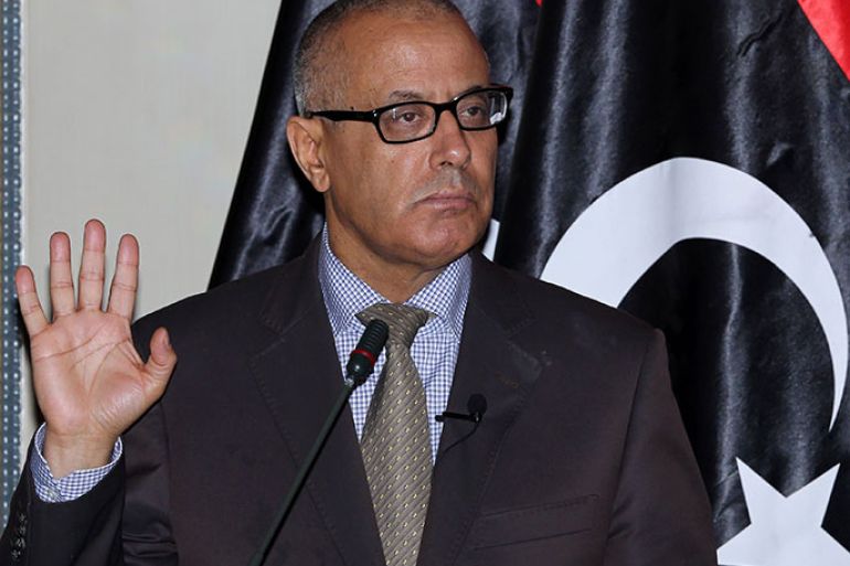 FILES) This file photo taken on on July 29, 2013 shows Libyan Prime Minister Ali Zeidan at a press conference in Tripoli.