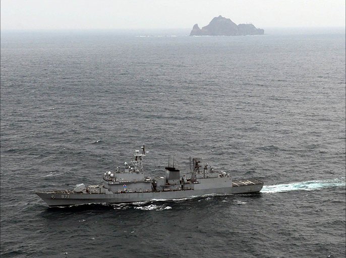 A South Korean Navy's warship take part in a defence drill near a set of remote islands called Dokdo in Korean and Takeshima in Japanese, east of Seoul October 25, 2013. Japan lodged a protest on Friday after South Korea's military and coast guard conducted an "unacceptable" defence drill on disputed islands, the latest flare-up in tension between the two Asian neighbours. REUTERS/South Korean Navy/News1 (SOUTH KOREA - Tags: POLITICS MILITARY)