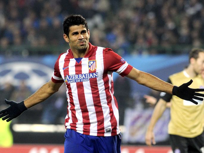 a03919842 Diego Costa of Atletico Madrid celebrate after scoring the UEFA Champions League Group G soccer match between FK Austria Vienna and at Ernst Happel Stadium in Vienna, Austria, 22 October 2013. EPA/HERBERT PFARRHOFER