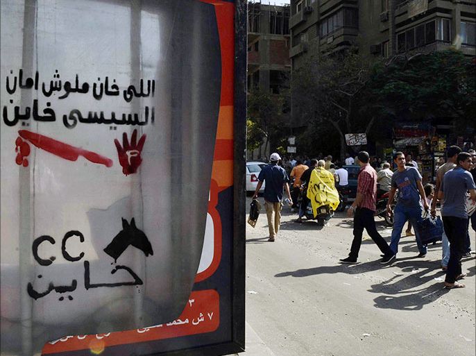 الشعارات السياسية تغزو الشوارع والأحياء في مصر