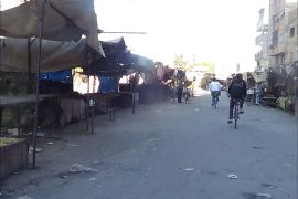 أسواق مخيم اليرموك فارغة ولا يجد الناس ما يأكلون