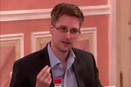 An image grab taken from a video released by Wikileaks on October 12, 2013 shows US intelligence leaker Edward Snowden speaking during a dinner with US ex-intelligence workers and activists in Moscow on October 9, 2013. Snowden warned of dangers to democracy in the first video released of the fugitive since Russia granted him temporary asylum in August. AFP PHOTO / WIKILEAKS