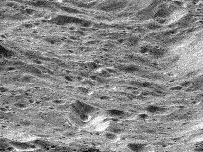 Craters within craters covering the scarred face of Saturn's moon Rhea are seen in this oblique, high-resolution view of terrain on the moon's western hemisphere taken by the Cassini spacecraft narrow-angle camera during a close flyby on 26 November 2005 and released by NASA and the Jet Propulsion Laboratory. Rhea is Saturn's second-largest moon, at 1,528 kilometers (949 miles) across. The Cassini-Huygens mission is a cooperative project of NASA, the European Space Agency and the Italian Space Agency. The Jet Propulsion Laboratory, a division of the California Institute of Technology in Pasadena, California, manages the mission for NASA's Science Mission Directorate in Washington, D.C. The Cassini Spacecraft was launched on 15 October 1997 and has been providing information on Saturn since July 2004. EPA/NASA/JPL/SPACE SCIENCE INSTITUTE/HO