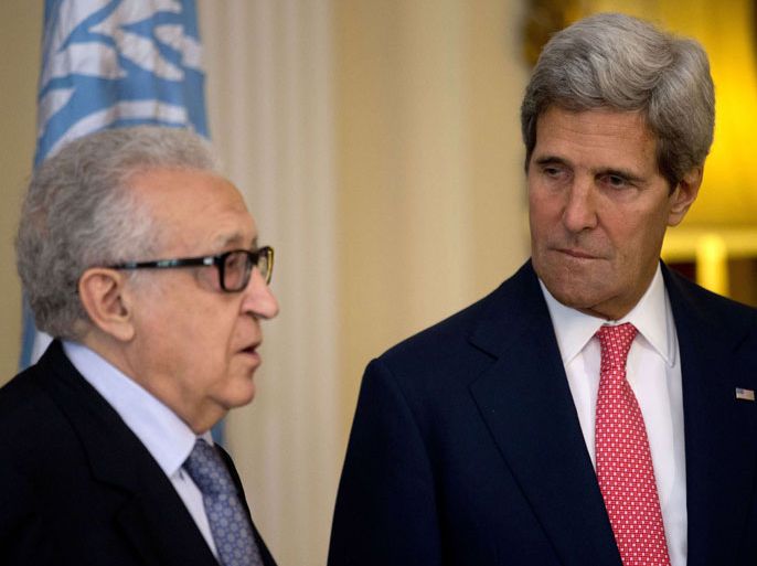 U.N-Arab League envoy for Syria Lakhdar Brahimi (L) speaks as U.S. Secretary of State John Kerry looks on after their meeting at Winfield House, the residence of the U.S. Ambassador to Britain, in London on October 14, 2013. Kerry and Brahimi said that an international conference to set up a Syrian transitional government must be organized urgently and held as soon as possible.
