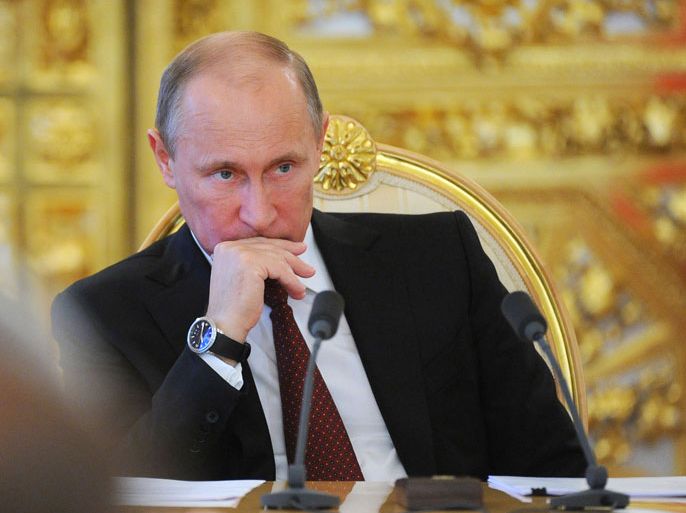 Russian President Vladimir Putin attends a meeting on presenting the Russian President's 2014-16 Budget Message in the Kremlin in Moscow, Russia, 13 June 2013. EPA/MIKHAIL KLIMENTYEV / RIA NOVOSTI / KREMLIN POOL
