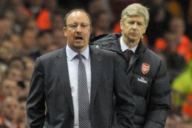 a01704619 Liverpool's.manager Rafael Benitez (L) shouting to his players as Arsenal's manager Arsene Wenger (R) looks on, during their English Barclays Premier League fixture played at Anfield in Liverpool, Britain, 21 April 2009. EPA/NICK WILKINSON NO ONLINE/INTERNET USE WITHOUT A LICENSE FROM THE FOOTBALL DATA CO.LTD