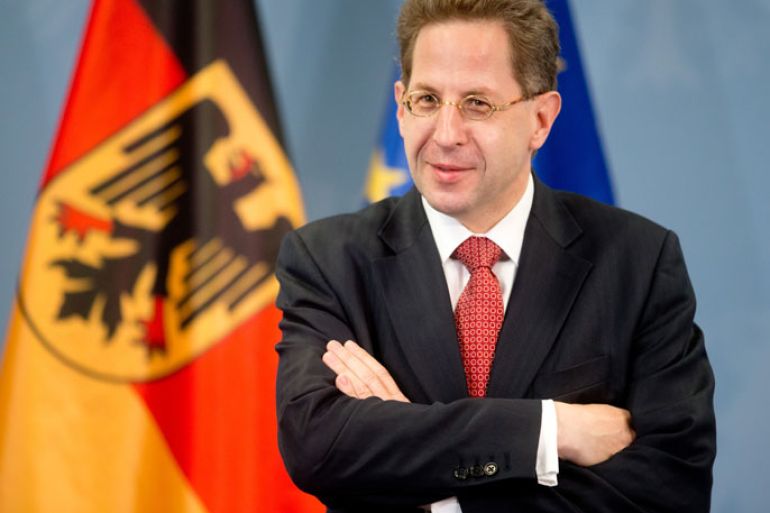 epa03331296 Hans-Georg Maassen, the new President of the German Federal Office for the Protection of the Constitution, poses for photographers before receiving his letter of appointment by German Minister of the Interior Hans-Peter Friedrich (unseen) at the Ministry of the Interior in Berlin, Germany, 01 August 2012. EPA/KAY NIETFELD
