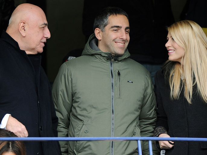 epa02593566 AC Milan CEO Adriano Galliani (L) speaks with Barbara Berlusconi, daughter of the Italian Prime Minister; prior a Serie A soccer match between Chievo and Milan in Verona, Italy on 20 February 2011. EPA/DANIEL DAL ZENNARO ANSA
