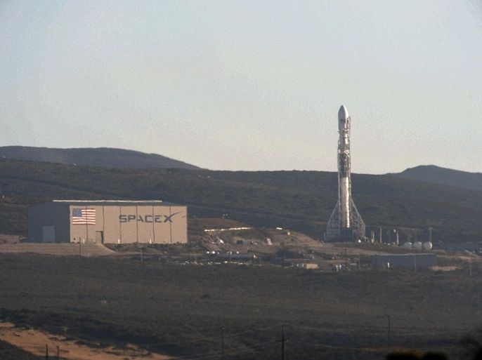 A SpaceX upgraded Falcon 9 rocket undergoes launch preparations at Vandenberg Air Force Base in California September 27, 2013. REUTERS/Gene Blevins
